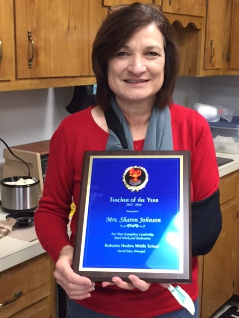 HankinsMiddle's tweet photo. Congratulations to Sharon Johnson for being selected as our 2017-18 Teacher of the Year. She was presented with a plaque from Mr. Diaz and Dr. Foster this morning. Mrs. Johnson has been a special education teacher at HMS for over 20 years. https://t.co/FfArEqfYV3