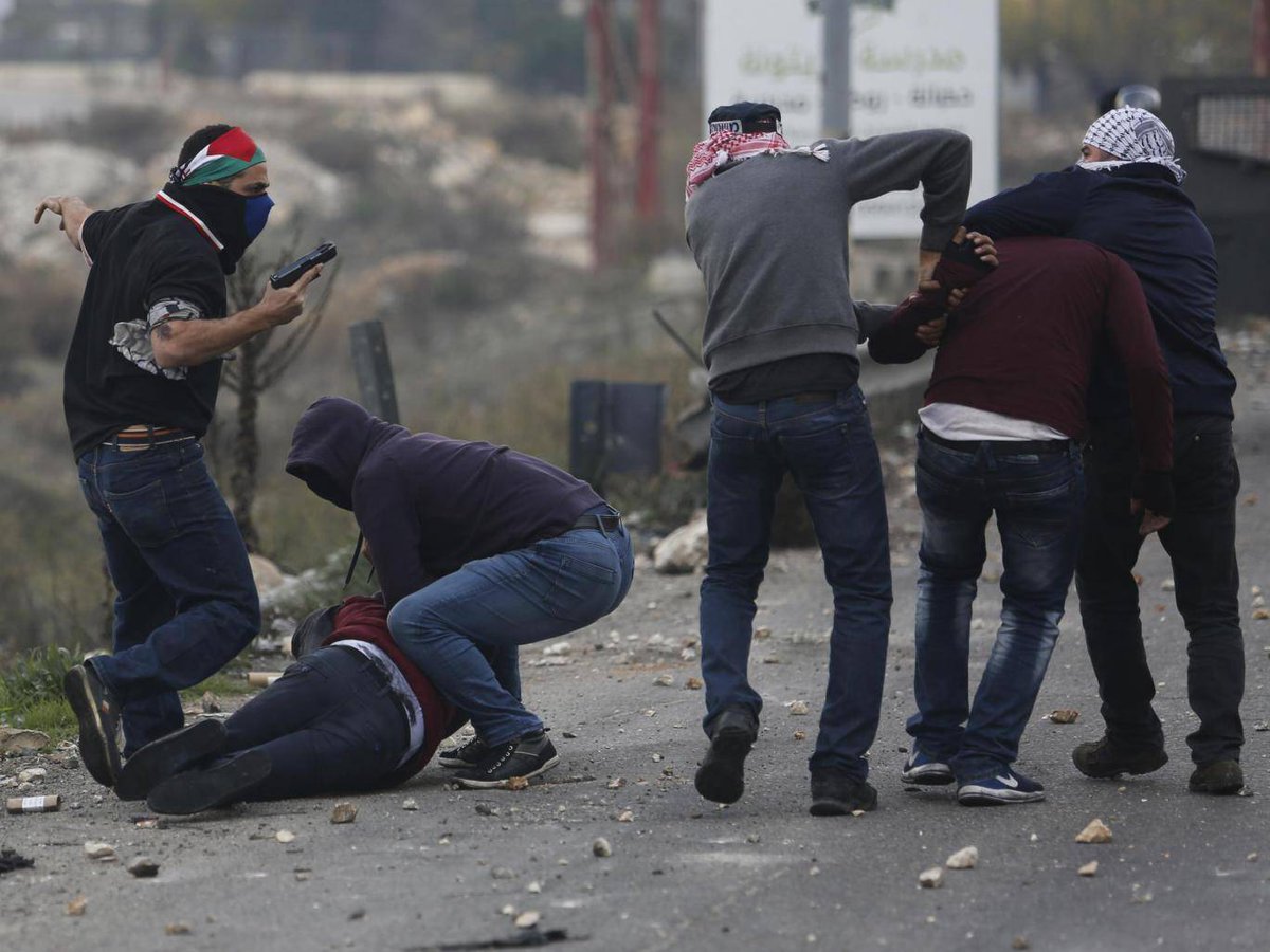 purplhaze42's tweet photo. Undercover Israeli police dressed as Palestinians arrest West Bank protesters https://t.co/nBNTtAdGFZ https://t.co/3fbLMeVEgg