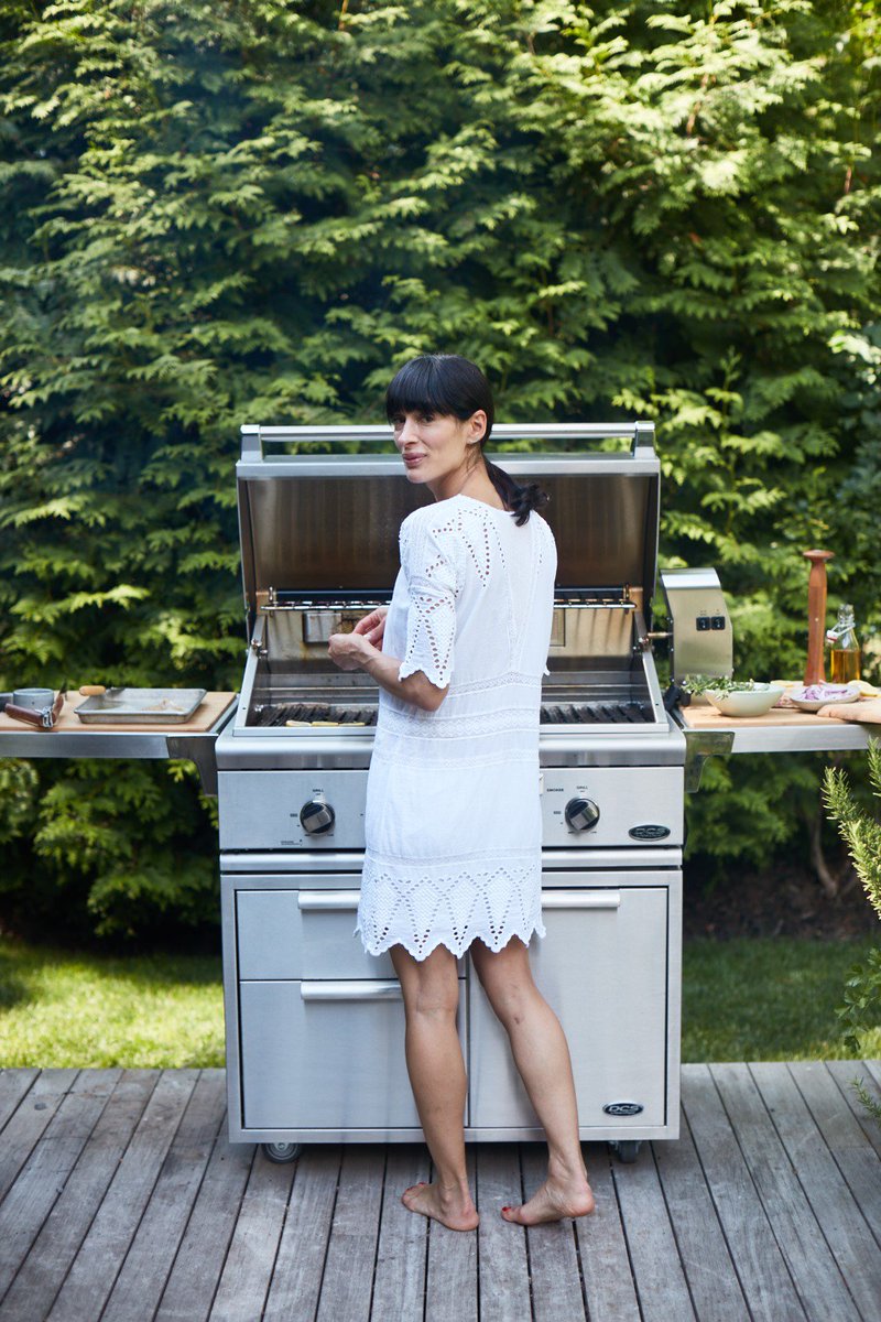 #TBT to <a href="/athenacalderone/">Athena Calderone</a>  grilling in her gorgeous Amagansett outdoor kitchen. For recipes from her grill, pick up a copy of Cook Beautiful.