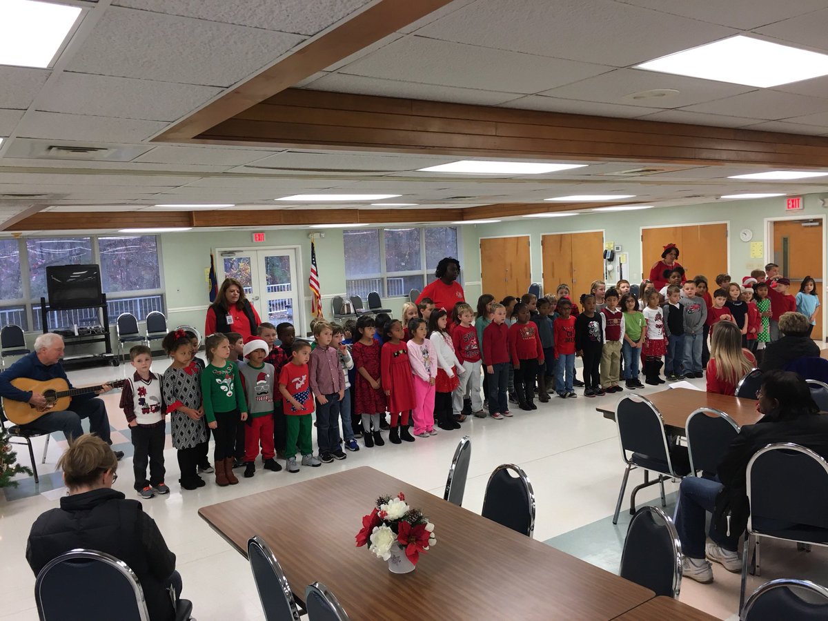 First graders sharing Christmas cheer at a local nursing home!