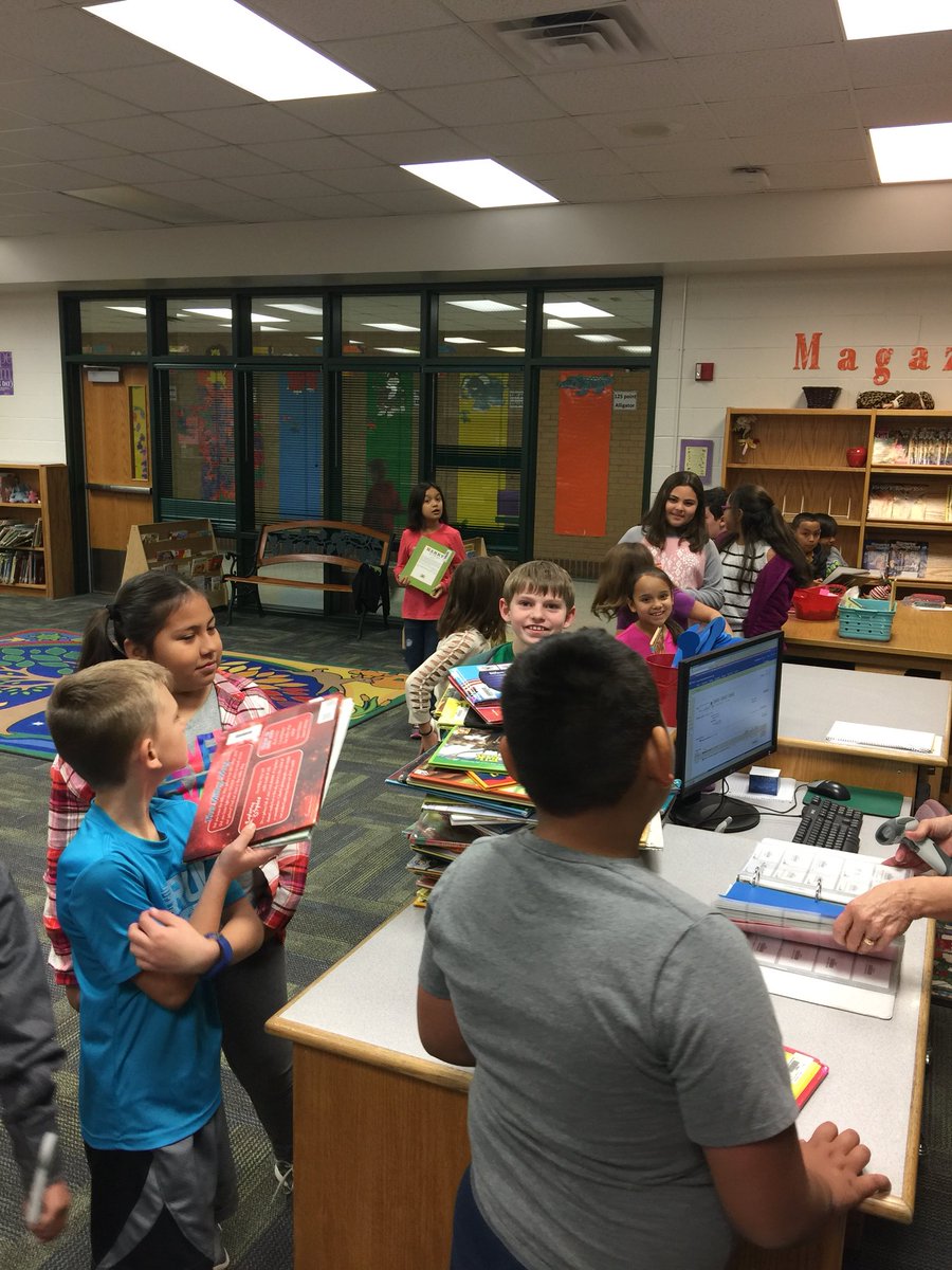 CrossTimbersEl's tweet photo. Check out this line of happy kids waiting to check out new books!  And check out that stack they turned in.  The book drop was overflowing with books that were read last night!  #azleISDway #CTloveslearning https://t.co/Q6TXgVAwsx
