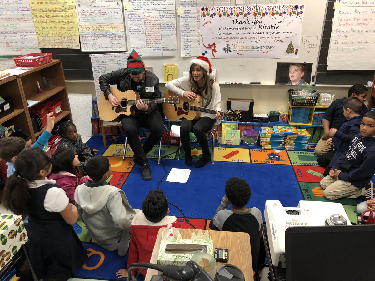 Kimbia and @TheWildNow visited a local elementary school today to spread some holiday cheer (and presents). We love finding ways to give back to our community. #kimbiavolunteers