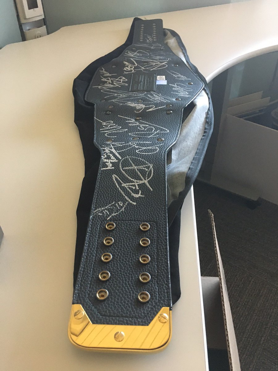 WWEgames's tweet photo. Find out who won this signed WWE title replica (both sides!) in the #WWE2K18 #Promos4Promos contest! https://t.co/XSZTYtjGvf https://t.co/XX2DfgbEYT