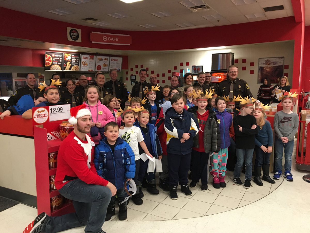 judyt41's tweet photo. Roosevelt kids get ready to shop with Ottawa County Deputies at Target. Thanks Target and Deputies! https://t.co/4ygj91K2N6