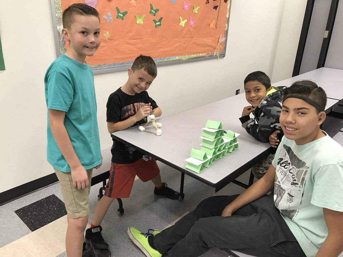 jenndefazio's tweet photo. 1st/6th grade STEM buddies! Making Christmas tree house of cards and knocking them down with our marshmallow catapults that we built from last week! @MViTElementary https://t.co/mmR0BUBoAt