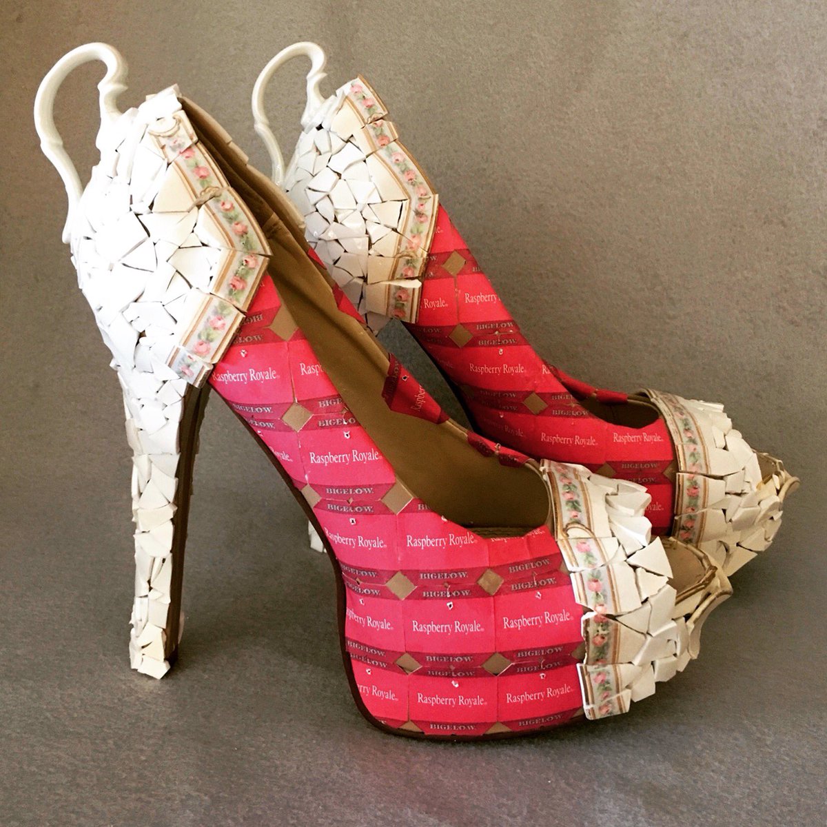 HHSCeramix's tweet photo. Olivia's investigation for her AP Studio Art Portfolio focuses on wearable art made from unexpected materials. What do you think of these killer heels embellished with teabag tags and broken teacups? #wearableart #ap3ddesign #fashion #TeaForShoe ☕️ 👠 https://t.co/2vaX49Or32