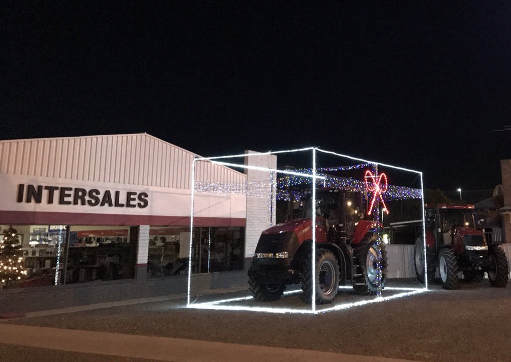 CaseIHAus's tweet photo. Great to see our dealerships getting into the festive season - the team at Intersales in Temora has this gift-wrapped tractor ready to go, while @KenwayandClark_ Wee Waa are offering their customers some festive sweet treats #Intersales #caseihaus #kenwayandclark https://t.co/SgPHw9aGmO