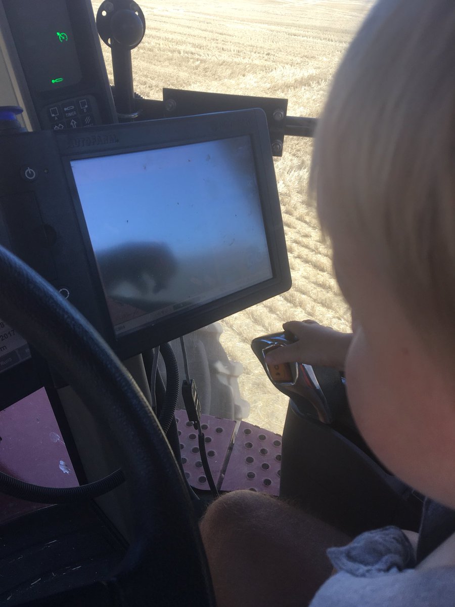 moroney_luke's tweet image. The young fellow come for a ride with me on the chaser. Got the changing of gears and turning on the auto steer sorted. Now to teach him the hydrolics and I’m set #noteven2 #farmboy #futurefarmer?