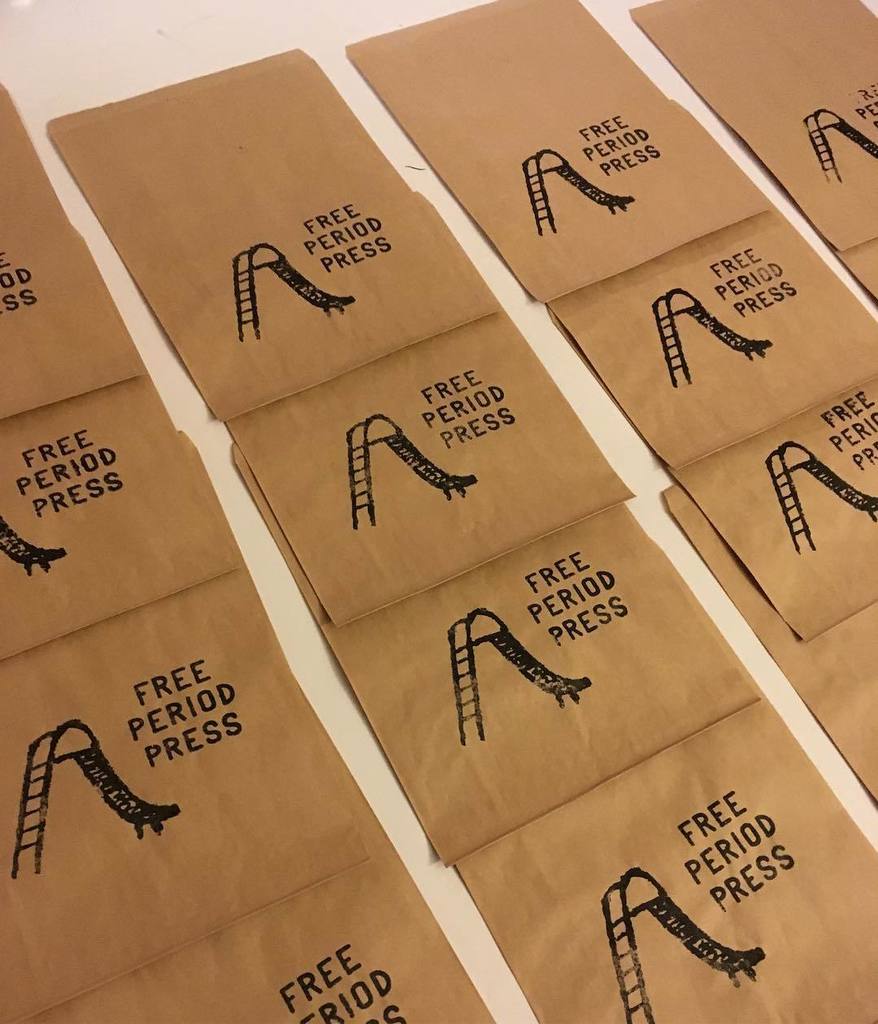 FreePeriodPress's tweet photo. Stamping bags for the last holiday show of the season— @clevelandflea all weekend in Ohio City! ✨ #shopcle #clevelandflea #cleflea https://t.co/sfEFGlRUxK https://t.co/Bc20Ubn4af