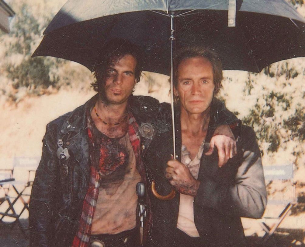 This is one of my favorite photos. 
Bill Paxton &amp; <a href="/lancehenriksen/">Lance Henriksen</a> on set for Near Dark, 1987. 
Directed by Kathryn Bigelow 
#womeninhorror