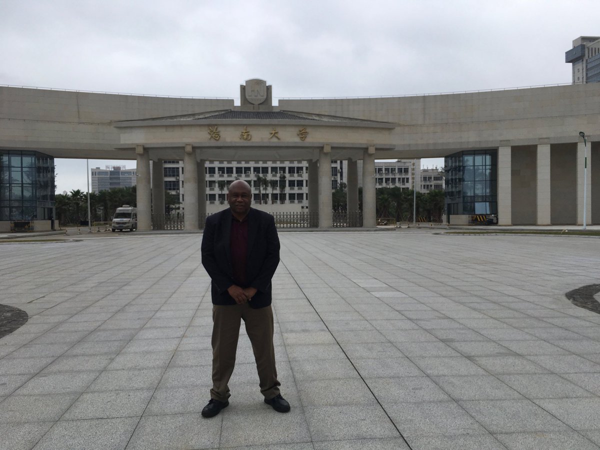 Standing outside Hainan University's new Southwest gate. I visited three Chinese universities this week and access gates is the common characteristic between the institutions. American institutions appear to lack access gates separating the institutions from the town or city.