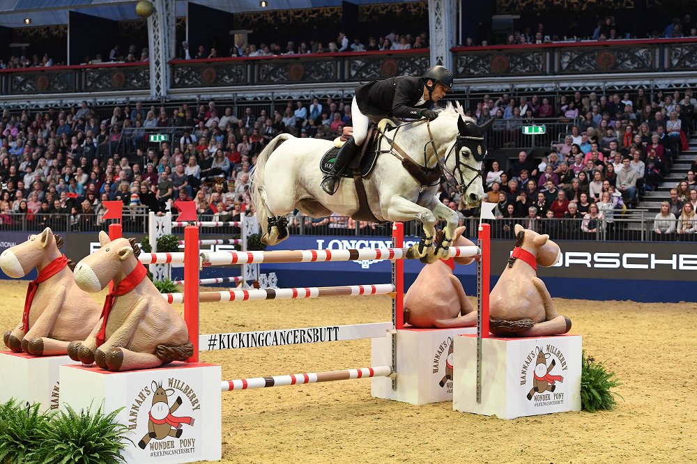 LondonHorseShow's tweet image. Peder Frederickson leading the way in yesterday's Musto Inside Edge Stakes class at #OlympiaHorse