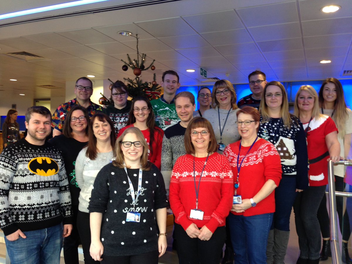 allianzuknews's tweet photo. It's Christmas Jumper Day! We're fundraising for our corporate charity @AsoAirAmbulance - here's just a small selection of the festive wear being sported in our Guildford office today #InsuranceGives https://t.co/7KyO54Shzn