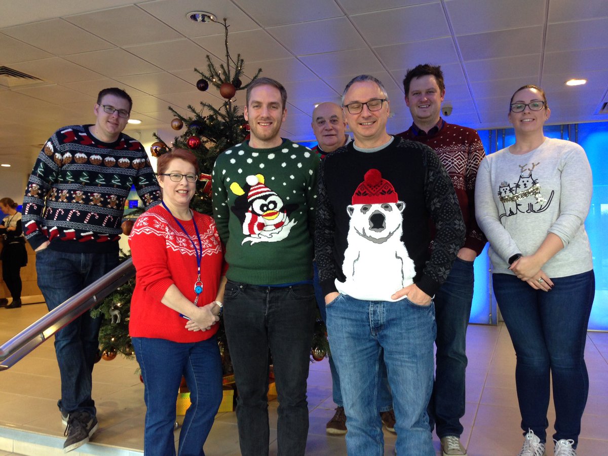 allianzuknews's tweet photo. It's Christmas Jumper Day! We're fundraising for our corporate charity @AsoAirAmbulance - here's just a small selection of the festive wear being sported in our Guildford office today #InsuranceGives https://t.co/7KyO54Shzn