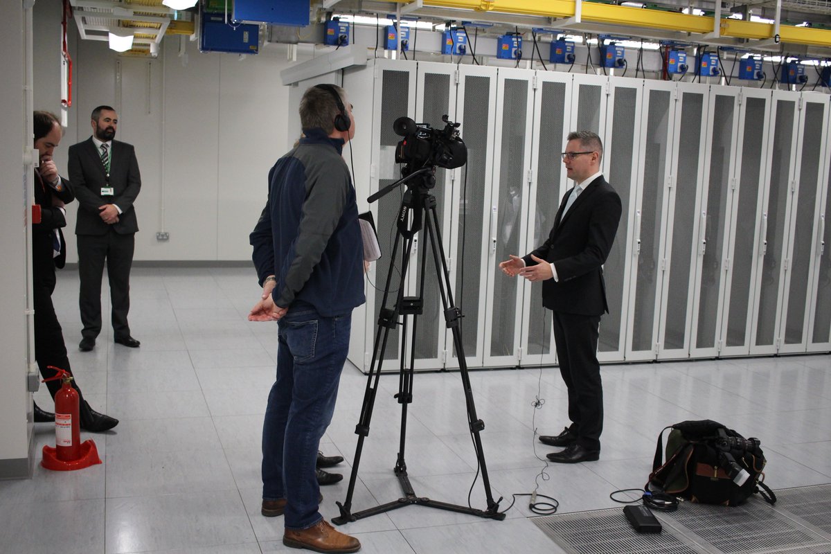 DataVita_Scot's tweet photo. Here's a peek behind the scenes with @DerekMackaySNP filming #ScotBudget announcements at Scotland's most resilient &amp; secure datacentre. £600m is a welcome investment to get superfast broadband to 100% of premises in Scotland. Thanks for coming to see us Derek! https://t.co/H7cE4iwyEr