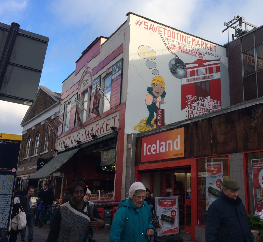 mirandaioss's tweet photo. Great anti-crossrail mural in Tooting #savetootingmarket from Crossrail's bulldozers https://t.co/SLKsX6gKOw