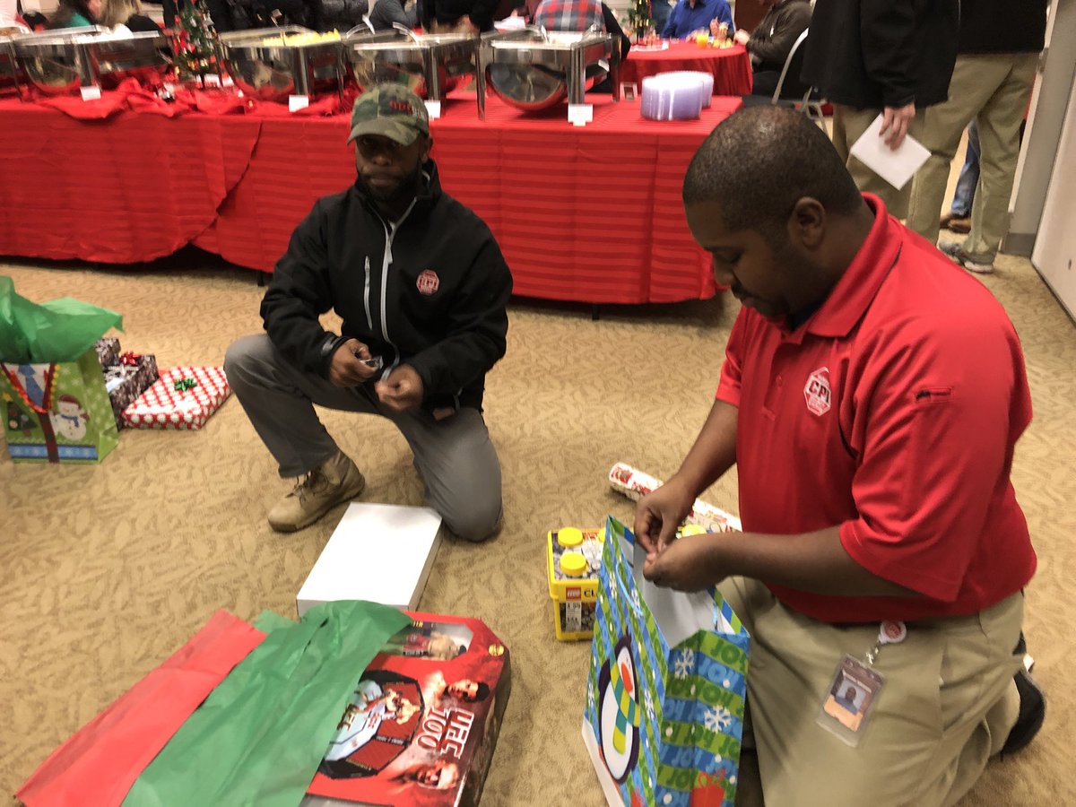 BrianFox46's tweet photo. PRESENTS ARE GETTING WRAPPED! Elves from @CMPD Explorers and @CPISecurity are wrapping hundreds of donated toys for the #cmpdexplorerschristmasproject https://t.co/jFOk7NINqe