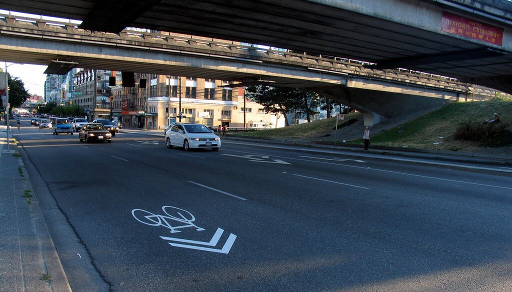 Penalosa_G's tweet photo. "No Surprise: Study Finds Sharrows Don’t Make Streets Safer. It isn’t enough to simply paint an arrow on the ground and call it a day." Need physical separation from cars. https://t.co/Q5NvHHmJME https://t.co/s89A4tFIcp