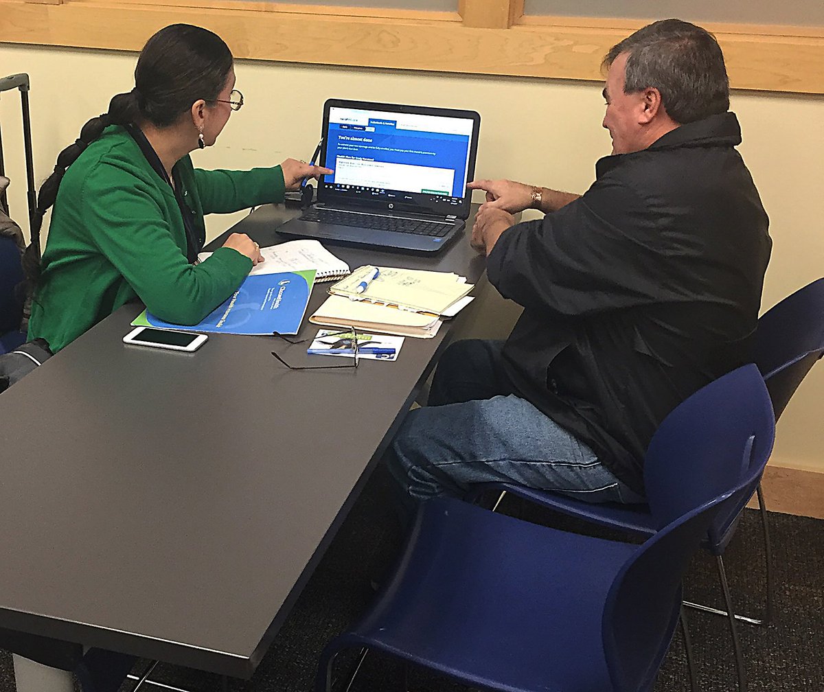 ChatmanLLC's tweet image. Today at Newark Public Library, a satisfied consumer enrolls in the Affordable Care Act Marketplace. Come in - today is the last day for Open Enrollment. We are here until 5 PM.