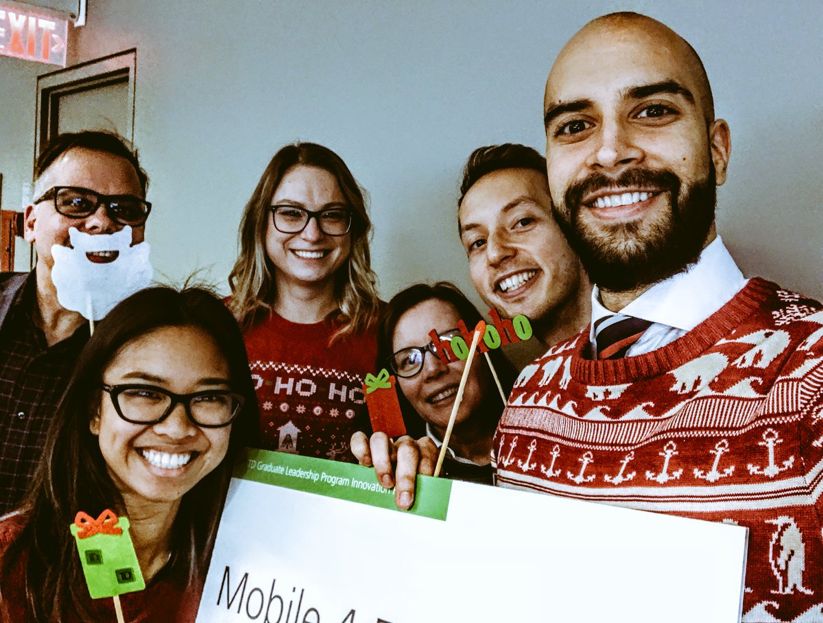 Our Mobile for Everyone team, in some pretty awesome festive sweaters, wishes you &amp; yours a very #MerryChristmas! 😀