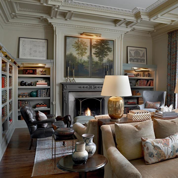 This beautiful library makes us want to cozy up with a good book. The countdown to the weekend is officially on! #JLInteriors #JLIdesign #library #bookcases #millwork