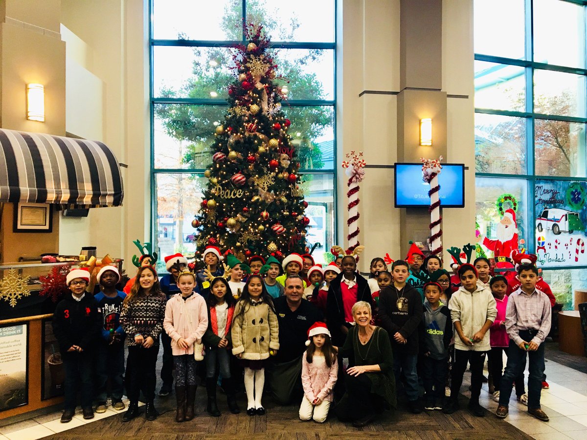 mpisdtigers's tweet photo. E.C. Brice Elementary School 3rd graders sang Christmas Carols in the lobby of TRMC today. Pictured with the students are TRMC CEO Terry Scoggins and Brice Music teacher Nan Verner. @trmc @brice #mpisdproud https://t.co/1NDvgRxmRC
