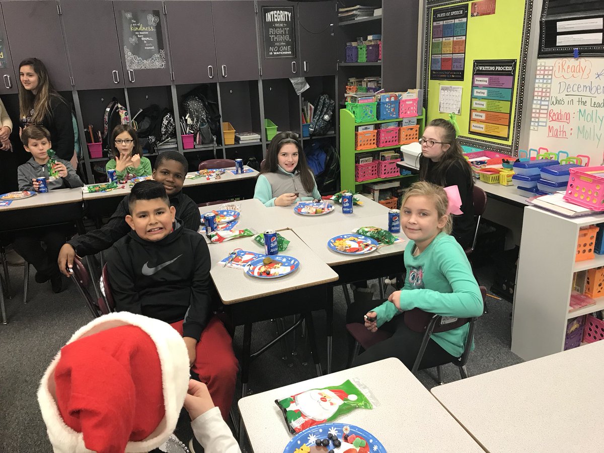 RdeFourth's tweet photo. Mrs. Veilleux’s 4th graders are having a holiday lunch with foods representing the different regions of NC: tree cakes for the mountains, goldfish for coastal plains, plus Mt. Olive pickles, Pepsi &amp; Krispy Kreme Donuts (both made in NC) https://t.co/Rqu1HZ3DL4