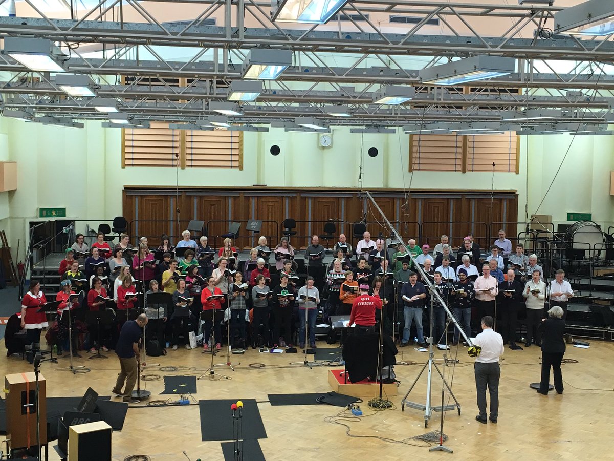 Christmas jumpers ahoy as the BBC Symphony Chorus &amp; @neilcpferris rehearse for their Christmas concert on Sunday. No tickets left but you can hear it <a href="/BBCRadio3/">BBC Radio 3</a> on Christmas Day!