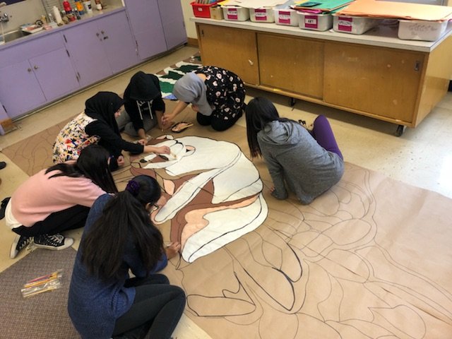 JG Workman students hard at work, creating our concert backdrop.