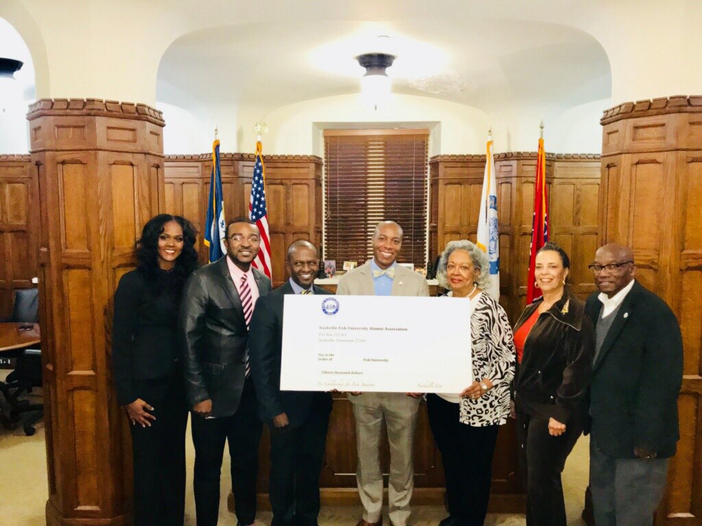 Nashville Fisk Alumni association presents Dr. Kevin Rome, president of Fisk a check for $15,000.