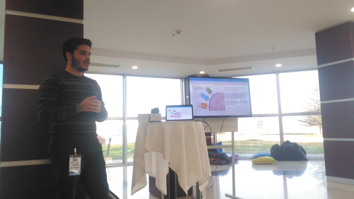 GdgKutahya's tweet photo. "Web Development with Spring Boot" adlı sunumuyla @alpccelik sahnede! #dfank #gdg #devfest17 https://t.co/hKWccAo32H