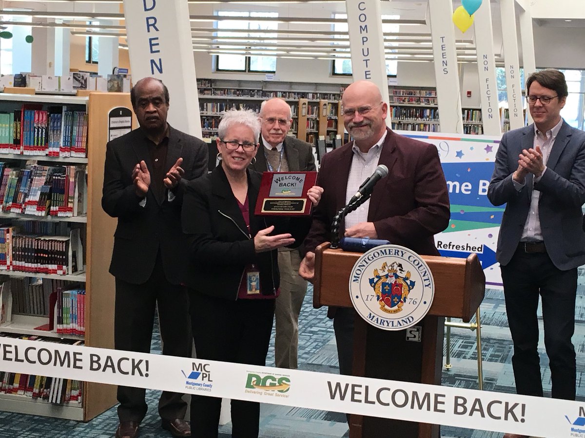 MCPL_Libraries's tweet photo. DGS Director Dise presents MCPL Acting Director Vassallo with a welcome back plaque #MCPLRefreshed #QuinceOrchardLibrary https://t.co/ijsua5rI7b