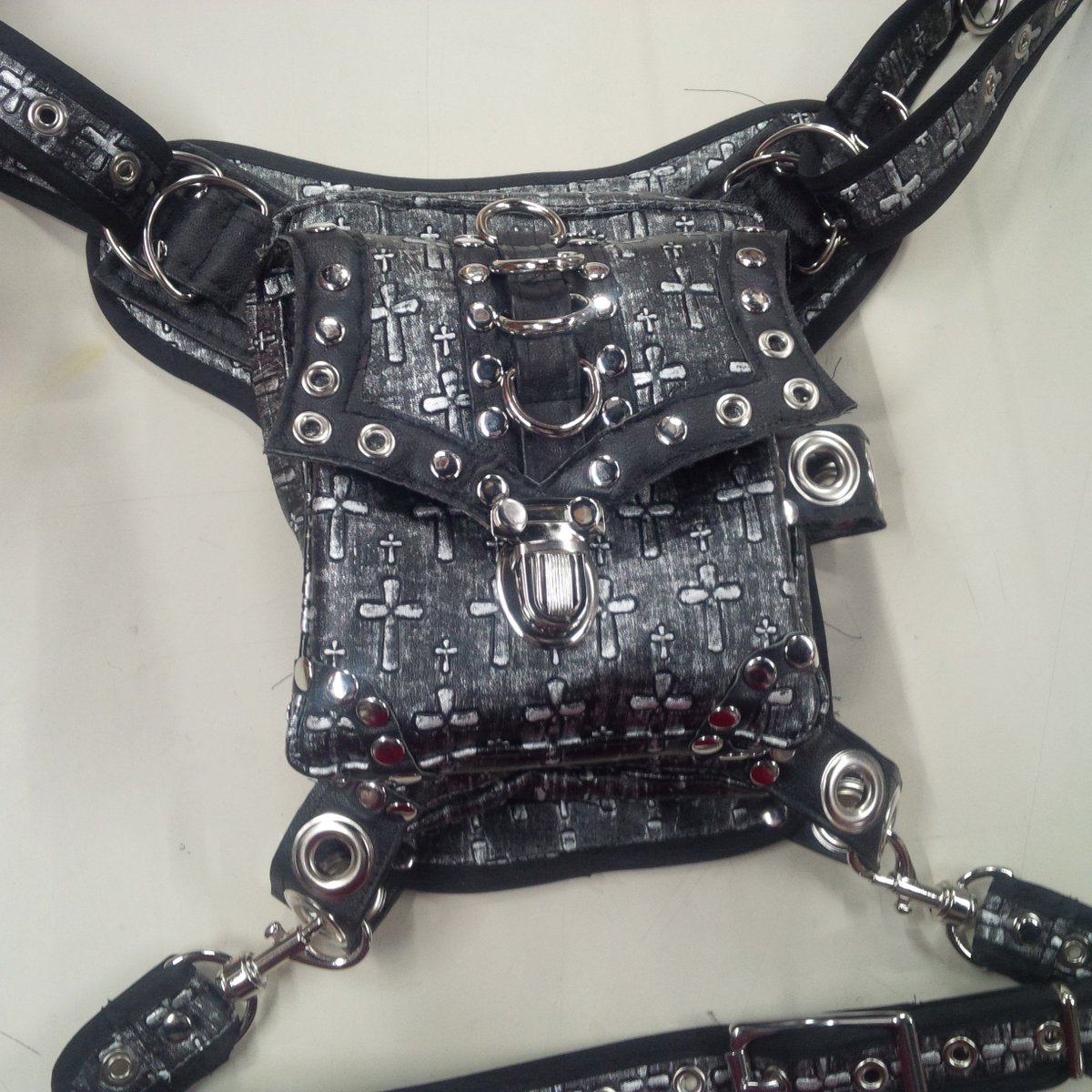 It's DONE, motherfuckers! It turned out great, but there was OH SO MUCH SWEARING. #goth #sewing #holsterbag