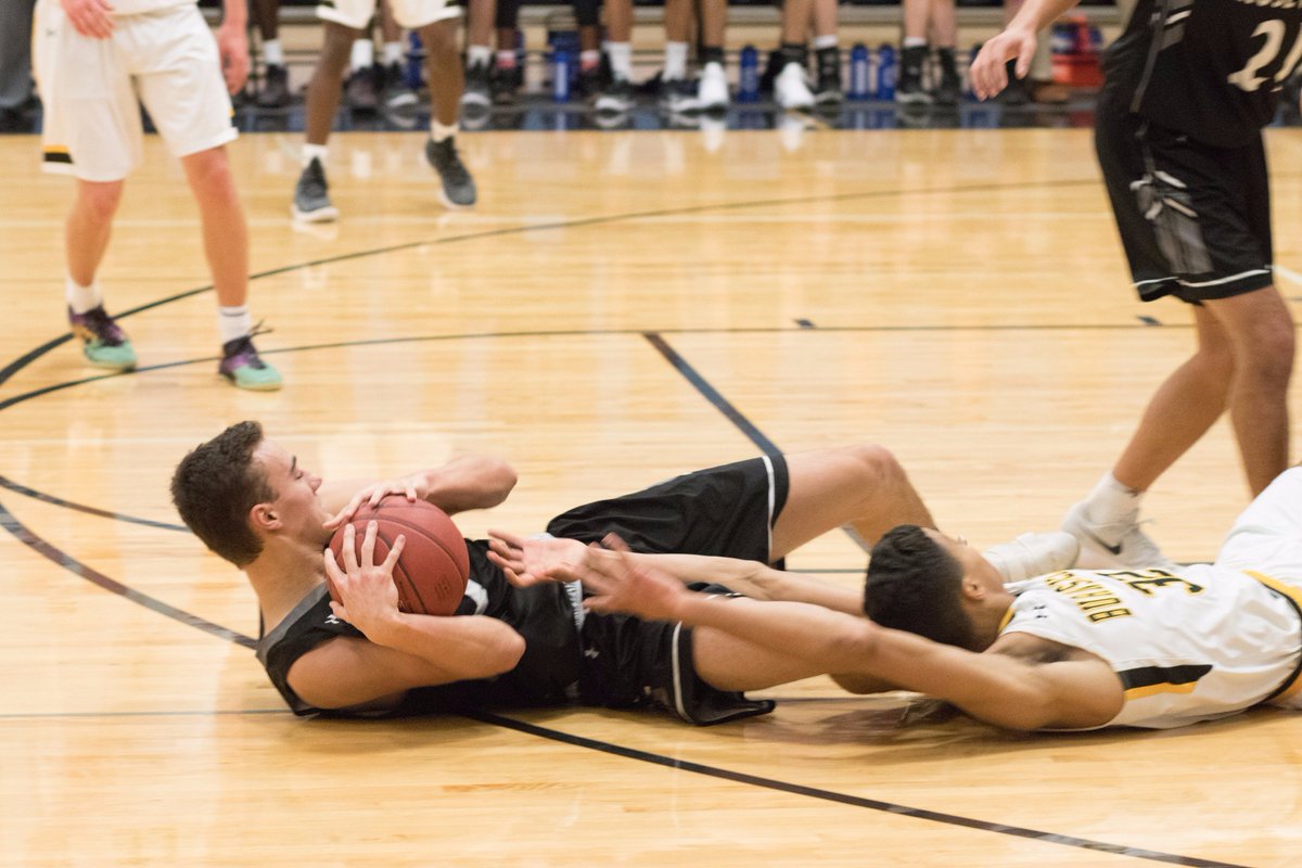 RBBChoops's tweet photo. League leading charge taker Nolan "Wall" Wald @N_Wald getting scrappy vs. Burnsville last week in a big win for #rosevillehoops Photo by @hh_nelson https://t.co/CTigoYQtGn