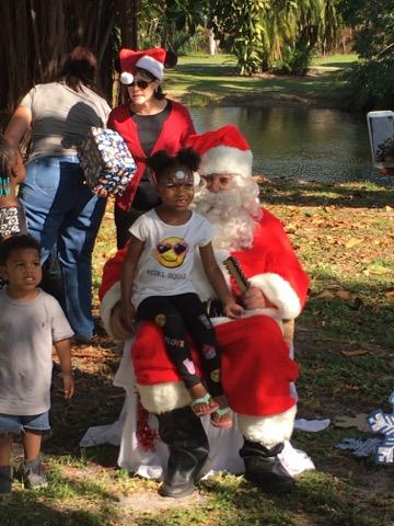WPBfire's tweet photo. Station #2 delivering Santa to Dreher Park. The kids got to explore the fire truck and tell Santa what they wanted for Christmas. #wpbfire #santa #wpb https://t.co/Hdebe7Qx3b