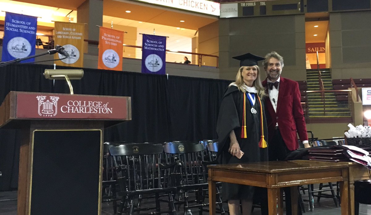CofC's tweet photo. Faculty Marshall and #CofC alumna Devon Hanahan with Jonathan Ray make the final touches to the stage. Ready to graduate?? #DecemberCommencement #Congrats https://t.co/EdwCzO5Vi3