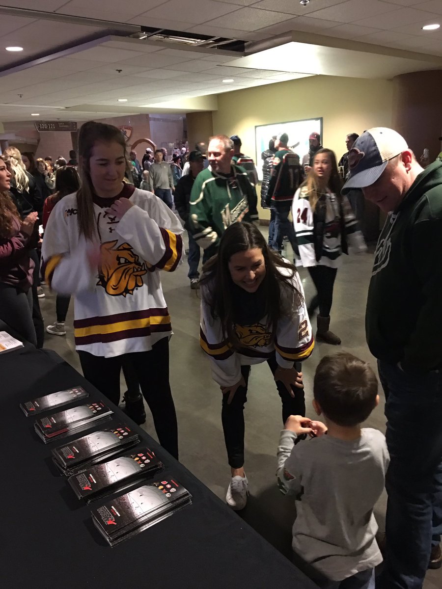 WCHA_WHockey's tweet photo. .@UMDWHockey players @lynnsanity029 and @LindsayCzech with a young fan before today's @mnwild game, part of Girls Hockey Weekend at the @XcelEnergyCtr. #WeAreWCHA #GrowTheGame https://t.co/Hg2eimdjyL