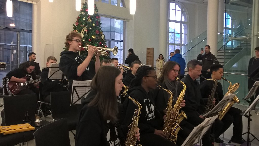 Ruddersmcfc's tweet photo. #oneeducationmus BCSB entertain a large crowd at MCR central library.  Such a good acoustic there. https://t.co/y6NorfLUr6