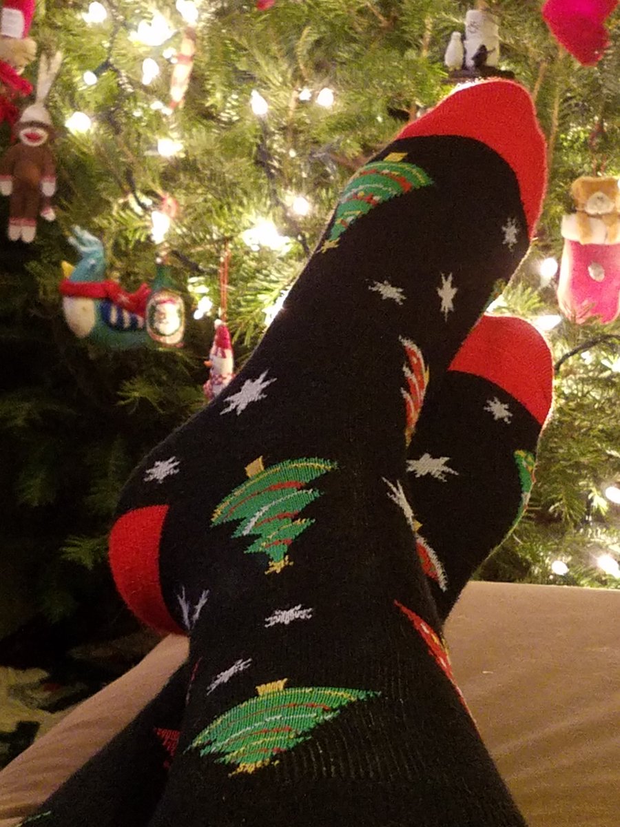 RonAndrews123's tweet photo. #IHXHolidayFun Staying warm by the tree in holiday socks! https://t.co/0SC3Qw1K4Y