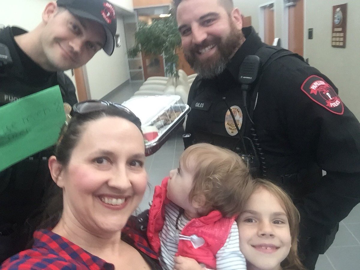 DarcyKoskovich's tweet photo. One of my favorite Christmas traditions! 🍪 We love our local police and firefighters! ❤️ Thank you @papillionpolice and @PapillionFire for keeping our community safe! #activityadventcalendar #serviceactivity https://t.co/ZVKyIVBX96