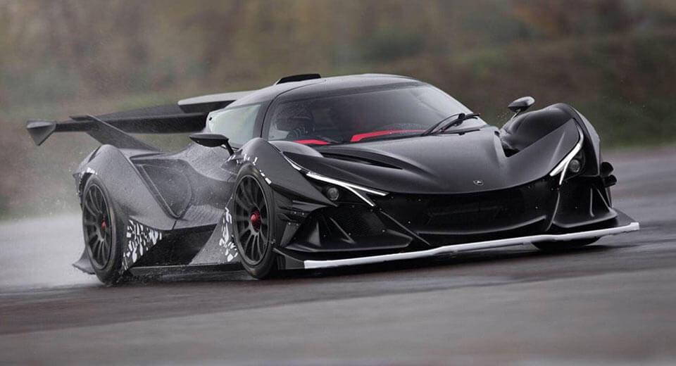 techeblog's tweet photo. Blacked out Apollo IE hits the track, is carbon fiber #supercar that does 0-60 in 2.7s. https://t.co/MiVTC9X9LJ #supercars #cars #luxury #gadgets #geek #racing #ferrari https://t.co/xyNsvH6zGo
