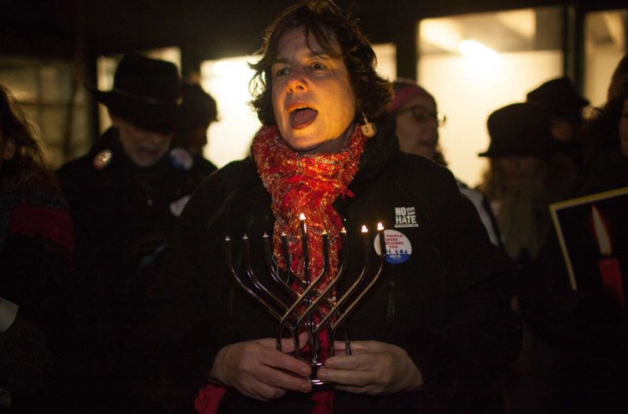JTAnews's tweet photo. A liberal group celebrated Hanukkah in Trump Tower — to protest Trump https://t.co/OIEDgRlkpS https://t.co/R6jH6kplAW