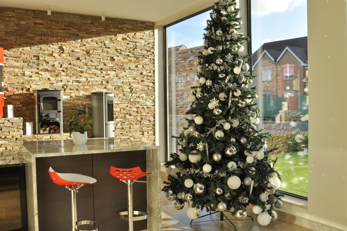 ivettandreed's tweet photo. It's officially Christmas in our Newmarket Road showroom! #ivettandreed #qualitysetinstone #fireplaces #worktops #woodburningfires #memorials #stonemasons https://t.co/njBo74GFiZ