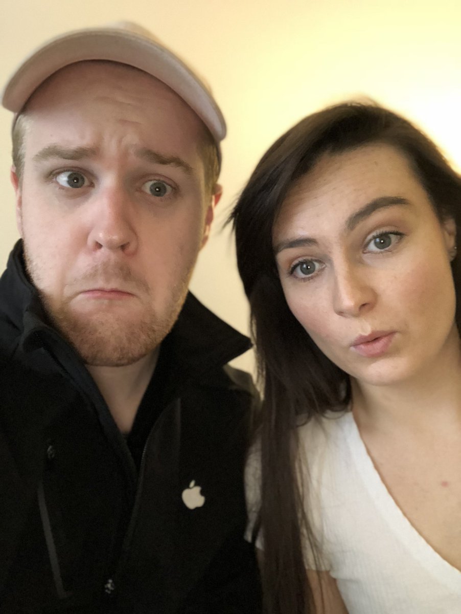 James and Molly pose for a selfie making goofy surprised faces.