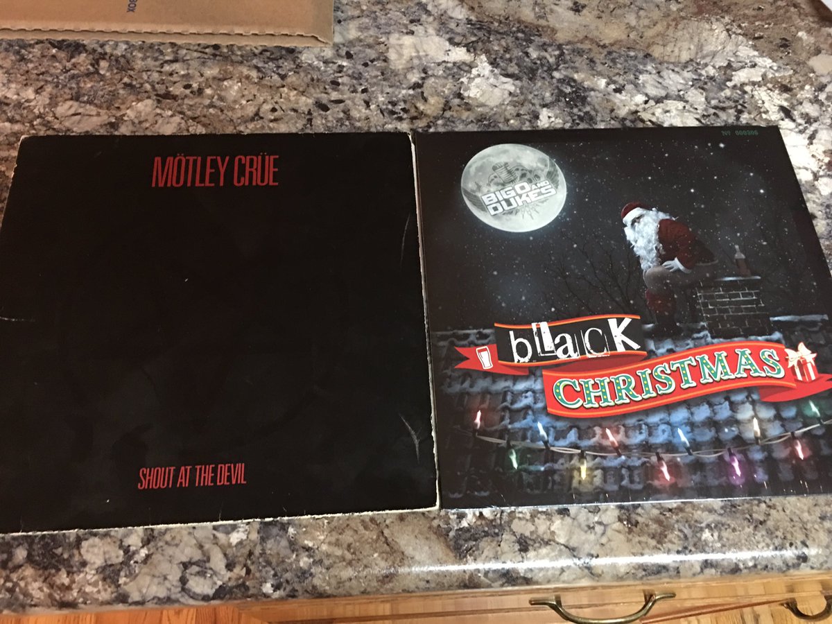 flatwhip's tweet photo. Just got this in the mail! Here is my @BigOandDukes black Christmas album next to the first album I bought when I was 11. According to @drabtshirt there's some connection. #llth #vinceneilyoung. Time to order a turntable through the @amazon tab at https://t.co/mR38PDpoil. https://t.co/KDOPa5nf0T