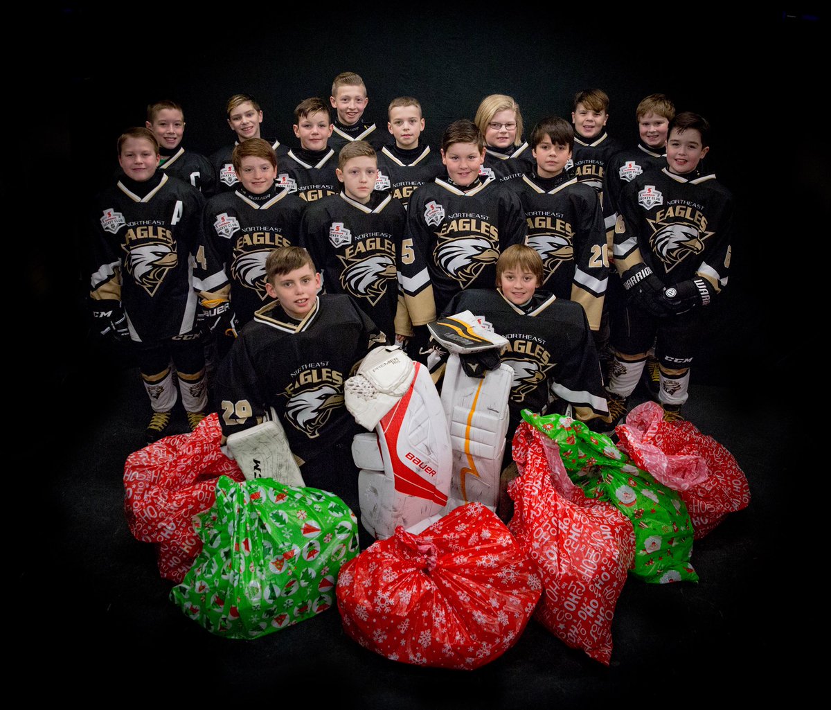 NEHHA Atom A raised over $800 and bought a load of gifts for the happy tree. @ne_eagles #eaglesproud