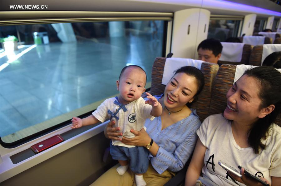 CGTNRadio's tweet photo. China's railway authority has announced that all of its bullet trains running between Beijing and Shanghai are now providing free fast #WIFI on board. Called #Fuxinghao, the fancy new trains can run up to 400km/h. They also provide free chargers for electronics too. https://t.co/mrOab2JZof