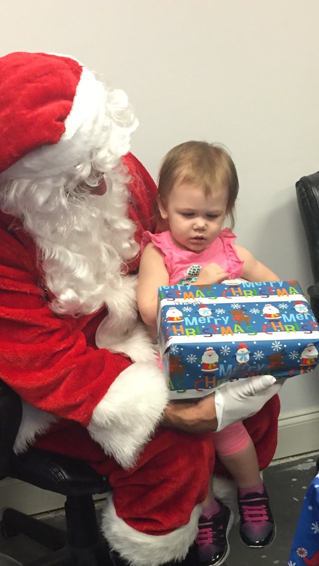 Lots of smiles, good times, and even a special guest at the 1122 Children's Xmas party!