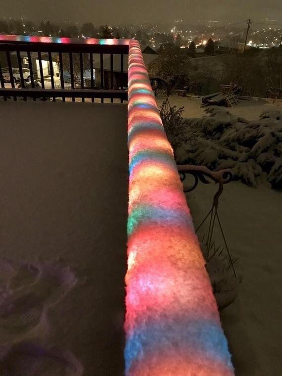 MindBlowing's tweet photo. Christmas lights under snow https://t.co/6OQuGFgs1E