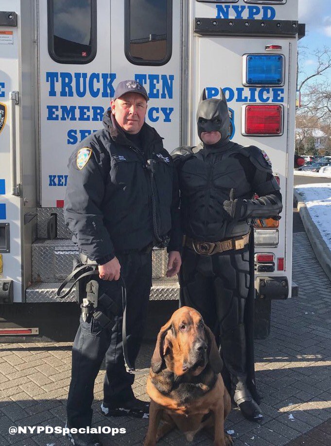 NYPDSpecialops's tweet photo. It’s not everyday that Batman gets to meet a superhero. A rare photo of #NYPD #ESU #K9 “Hudson” without his cape and mask at the St. Mary’s Children’s Hospital - Holiday Party https://t.co/J8Vz9YFhKu